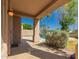 Covered patio offers views of the pool and desert landscaping at 5953 W Aurora Dr, Glendale, AZ 85308