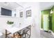 A well-lit bathroom with a console sink, white subway tile, and modern fixtures, offering a clean and stylish design at 6314 N 14Th St, Phoenix, AZ 85014