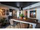 Bright dining room with an oversized table, contemporary chandelier and neutral color palette provides an elegant gathering space at 6314 N 14Th St, Phoenix, AZ 85014