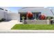 Charming home with well-maintained lawn, olive front door, and an attached garage at 6314 N 14Th St, Phoenix, AZ 85014