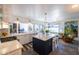 A bright, open kitchen features an island, modern lighting, and a seamless transition to the living area at 6314 N 14Th St, Phoenix, AZ 85014
