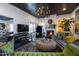 Cozy living room features a fireplace, stylish decor, and a large television at 6314 N 14Th St, Phoenix, AZ 85014