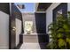 Outdoor shower with a dark accent wall, perfect for rinsing off after a swim at 6314 N 14Th St, Phoenix, AZ 85014