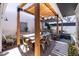 Spacious patio area with pergola, shade canopy, comfortable seating, and outdoor dining area at 6314 N 14Th St, Phoenix, AZ 85014