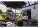 Charming patio with comfortable seating, stylish decor, and lush greenery creating a relaxing retreat at 6314 N 14Th St, Phoenix, AZ 85014