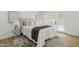 Serene bedroom featuring soft textures, natural light, and a stylish area rug at 6351 E Waltann Ln, Scottsdale, AZ 85254