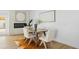 Charming dining area with modern furniture, a fireplace, and natural light at 6351 E Waltann Ln, Scottsdale, AZ 85254
