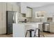 Well-equipped kitchen featuring a stainless steel refrigerator, and a functional island at 6351 E Waltann Ln, Scottsdale, AZ 85254