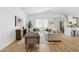 Bright and airy living room with vaulted ceilings and an open concept kitchen at 6351 E Waltann Ln, Scottsdale, AZ 85254
