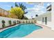 Backyard pool with a clear blue water surrounded by a concrete deck at 6351 E Waltann Ln, Scottsdale, AZ 85254