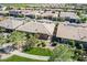 Attractive aerial view highlighting a neighborhood with coordinated homes, green spaces, and well-designed streets at 650 E Myrtle Pass, Queen Creek, AZ 85140