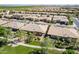 Attractive aerial view highlighting a neighborhood with coordinated homes, green spaces, and well-designed streets at 650 E Myrtle Pass, Queen Creek, AZ 85140