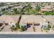 Stunning aerial view of a modern home with a tile roof, manicured front yard, and charming desert landscaping at 650 E Myrtle Pass, Queen Creek, AZ 85140