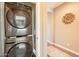 Laundry room with stacked washer and dryer units at 650 E Myrtle Pass, Queen Creek, AZ 85140