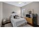Bedroom featuring bright natural light, neutral paint, and a sitting area at 6694 S Banning St, Gilbert, AZ 85298