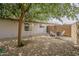 Backyard firepit area with seating and a rainbow swing at 720 W Gail Ct, Gilbert, AZ 85233