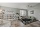 Spacious playroom with tile flooring and a cozy seating area at 720 W Gail Ct, Gilbert, AZ 85233