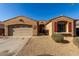 Charming single-story home with a two-car garage and low-maintenance desert landscaping, perfect for easy living at 7424 W Pioneer St, Phoenix, AZ 85043