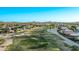 Aerial shot featuring a well-maintained golf course within a residential neighborhood at 766 E Taylor Trl, San Tan Valley, AZ 85143