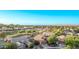 This aerial view features mountain views in the distance and desert landscapes at 766 E Taylor Trl, San Tan Valley, AZ 85143