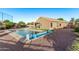 Backyard with a fenced pool and a covered patio at 766 E Taylor Trl, San Tan Valley, AZ 85143