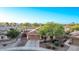 Lovely single-Gathering home with a well-maintained lawn, mature trees, and a welcoming facade at 766 E Taylor Trl, San Tan Valley, AZ 85143