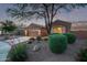 Single-story home featuring desert landscaping, stone accents, and a spacious two-car garage at 766 E Taylor Trl, San Tan Valley, AZ 85143