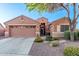 Beautiful single-story home featuring desert landscaping and an attached two-car garage at 766 E Taylor Trl, San Tan Valley, AZ 85143