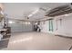 Spacious garage with painted walls, sealed floor and lots of room for storage at 766 E Taylor Trl, San Tan Valley, AZ 85143
