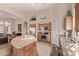 Open kitchen area with an island, stainless appliances, and seamless transition to the living spaces at 766 E Taylor Trl, San Tan Valley, AZ 85143