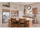 Inviting kitchen featuring a central island, stainless steel appliances, and ample storage at 766 E Taylor Trl, San Tan Valley, AZ 85143