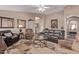 Well-appointed living room featuring comfortable seating, decorative accents, and natural light at 766 E Taylor Trl, San Tan Valley, AZ 85143