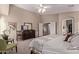 Spacious main bedroom with a ceiling fan, carpeting, and natural light at 766 E Taylor Trl, San Tan Valley, AZ 85143