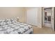 Cozy bedroom with closet and door to the kitchen at 81 E Rock Wren Dr, San Tan Valley, AZ 85143