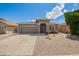 Charming single-story home featuring a low maintenance desert landscape, covered entry and two car garage at 81 E Rock Wren Dr, San Tan Valley, AZ 85143