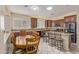 Eat-in kitchen with granite countertops, a kitchen island, and stainless steel appliances at 81 E Rock Wren Dr, San Tan Valley, AZ 85143