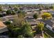 Gorgeous aerial view of the neighborhood, with beautiful landscaping, and mountain views at 8228 E Oak St, Scottsdale, AZ 85257