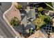 Birds-eye view of the home's roofline, yard, surrounding streets, and other homes at 8228 E Oak St, Scottsdale, AZ 85257