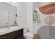 Clean and modern bathroom with granite countertops, stylish shower curtain, and contemporary fixtures at 854 S San Marcos Dr # A12, Apache Junction, AZ 85120