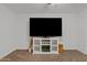 Contemporary bedroom featuring entertainment center and neutral colored carpet at 854 S San Marcos Dr # A12, Apache Junction, AZ 85120