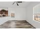 Bright living room featuring hard surface floors, neutral walls, and multiple windows for natural light at 854 S San Marcos Dr # A12, Apache Junction, AZ 85120