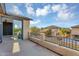 Balcony with iron railing with a view of the pool and backyard at 880 E Wimpole Ave, Gilbert, AZ 85297