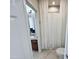 Bathroom featuring granite countertop vanity, tile flooring, and shower with striped curtain at 880 E Wimpole Ave, Gilbert, AZ 85297