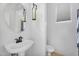 Clean bathroom features a modern vanity, stylish fixtures, and neutral tones at 880 E Wimpole Ave, Gilbert, AZ 85297