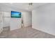 This spacious bedroom has plush carpet and is complemented by an entertainment area at 880 E Wimpole Ave, Gilbert, AZ 85297