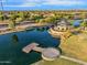 Overhead view of lakefront community featuring a gazebo, pier, and scenic water views at 880 E Wimpole Ave, Gilbert, AZ 85297