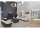 Open living area featuring high ceilings and neutral colors at 880 E Wimpole Ave, Gilbert, AZ 85297