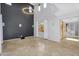 Great room boasting vaulted ceilings, tile floors, and natural light at 880 E Wimpole Ave, Gilbert, AZ 85297