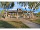 Community recreation area with a covered picnic pavilion, playground, and seating offers a versatile outdoor space at 880 E Wimpole Ave, Gilbert, AZ 85297