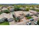 Street view showcasing a well-maintained home with desert landscaping and surrounding neighborhood at 9225 E Pine Valley Rd, Scottsdale, AZ 85260